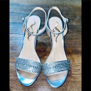 Beautiful high heeled sandals, worn only once.